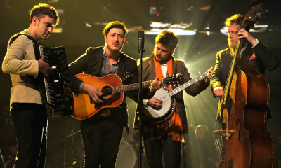 LOS ANGELES, CA - FEBRUARY 08:  (L-R) Musicians Ben Lovett, Marcus Mumford, 'Country' Winston Marshall and Ted Dwane of Mumford & Sons perform onstage at MusiCares Person Of The Year Honoring Bruce Springsteen on February 8, 2013 in Los Angeles, California.  (Photo by Larry Busacca/Getty Images for NARAS)